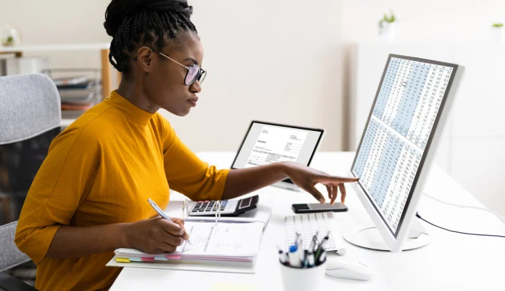 an employee checking a new software system