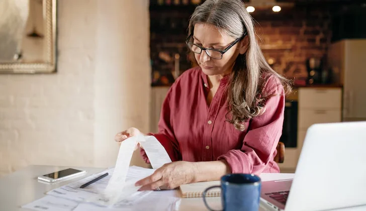 an employee checking some documents
