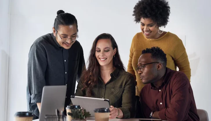 some employees checking a project