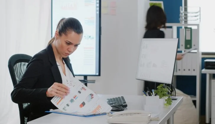 an employee checking data performance