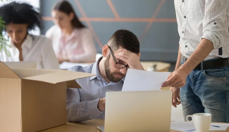a stressed employee at work