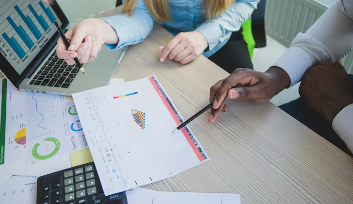 some team members working on employee data