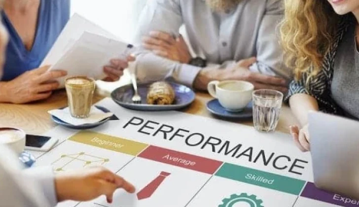 team members checking employee performance