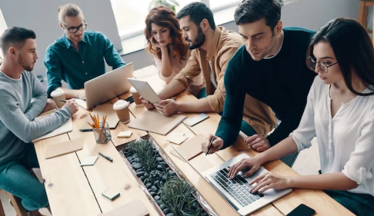 a group of employees working on a project