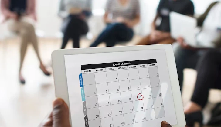 an employee checking the performance schedule
