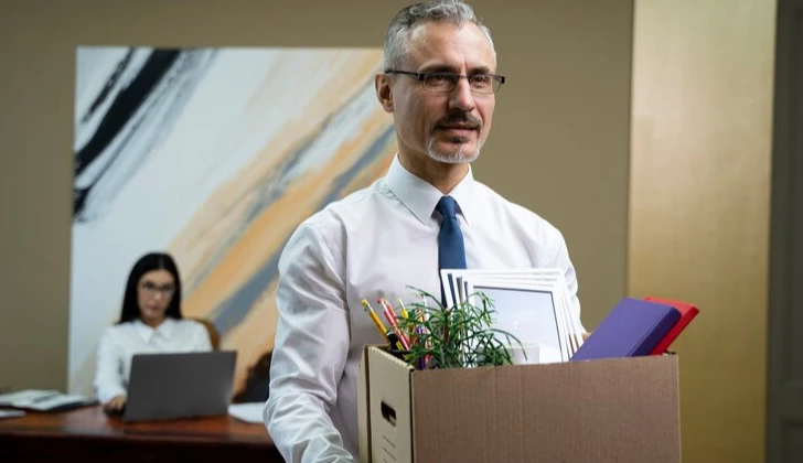 a male employee leaving work