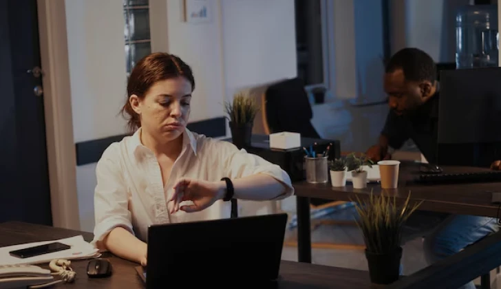 an employee checking her time