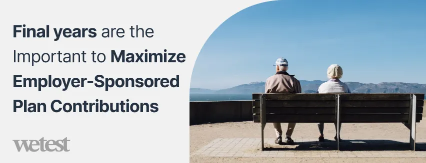 A retired couple looking at a view of mountains sitting on a bench