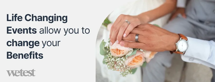 Picture of a man and a woman's hand together in a wedding shoot with their couple rings as the focus
